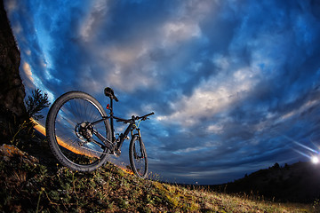 Image showing Mountain bike against sunset