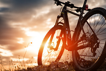 Image showing Mountain bike against sunset