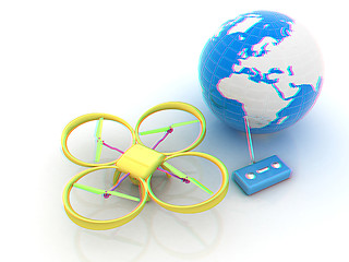 Image showing Quadrocopter Drone with Earth Globe and remote controller on a w