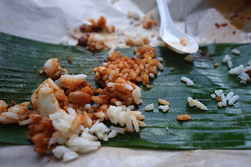 Image showing Leftover rice on banana leave