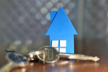 Image showing Bunch of keys with house shaped cardboard