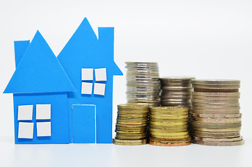 Image showing House model and stacks of coins