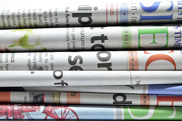Image showing Newspapers folded and stacked