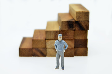 Image showing Way to success with  businessman and wood block step