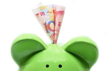 Image showing Green piggy bank with China currency