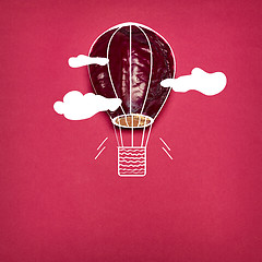 Image showing The pop art collage of red cabbage and aerostat on red background