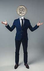 Image showing Businessman with an coin instead of his head