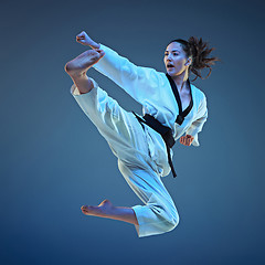 Image showing The karate girl with black belt