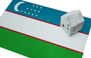 Image showing Small house on a flag - Uzbekistan