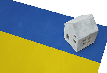 Image showing Small house on a flag - Ukraine