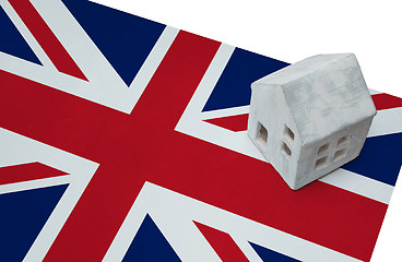 Image showing Small house on a flag - UK