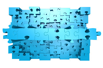 Image showing Blue jigsaw puzzle with 3D effect