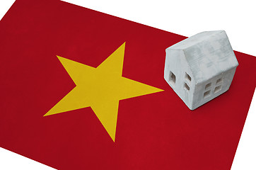 Image showing Small house on a flag - Vietnam