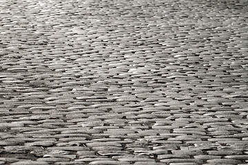 Image showing Cobblestones illuminated by moonlight