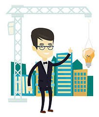 Image showing Man pointing at idea bulb hanging on crane.