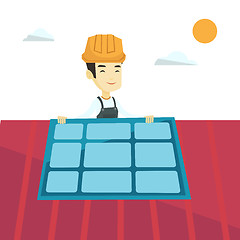 Image showing Constructor installing solar panel.