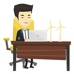 Image showing Man working with model of wind turbines.