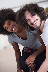 Image showing multiethnic couple renovating their home