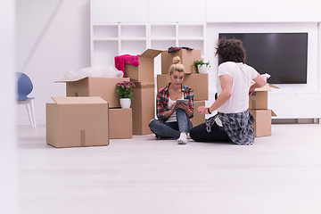 Image showing young couple moving  in new house