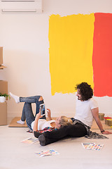 Image showing Happy young couple relaxing after painting