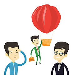 Image showing Business man hanging on balloon.