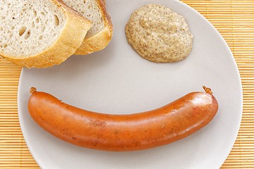 Image showing tasty sausages with bread and mustard