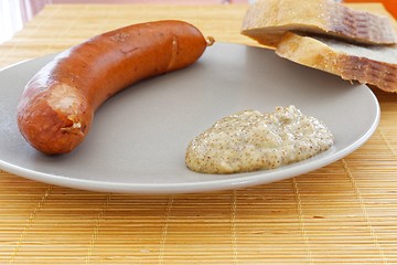 Image showing tasty sausages with bread and mustard