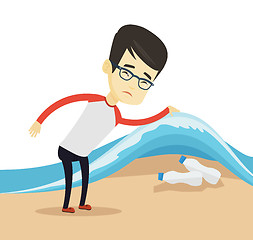 Image showing Man showing plastic bottles under sea wave.