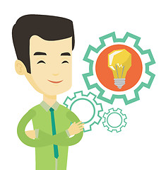 Image showing Man with business idea bulb in gear.