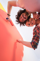 Image showing couple painting interior wall