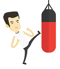 Image showing Man exercising with punching bag.