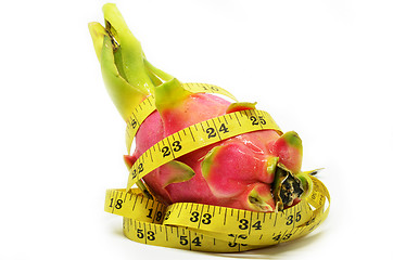 Image showing Dragon fruit and measure tape