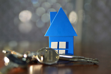 Image showing Bunch of keys with house shaped cardboard