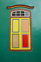 Image showing Colorful window a colonial house