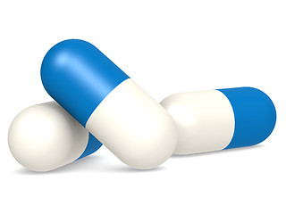 Image showing Medicine capsules isolated blue and white
