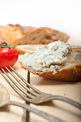 Image showing fresh blue cheese spread ove french baguette