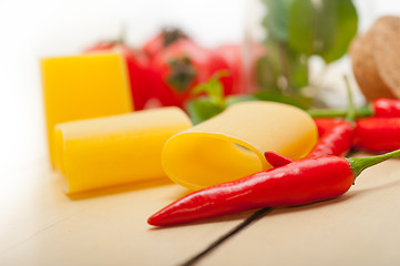 Image showing Italian pasta paccheri with tomato mint and chili pepper