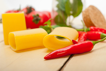 Image showing Italian pasta paccheri with tomato mint and chili pepper