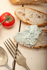 Image showing fresh blue cheese spread ove french baguette