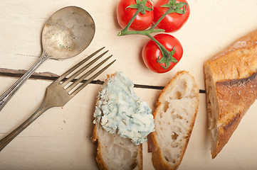 Image showing fresh blue cheese spread ove french baguette