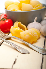 Image showing Italian snail lumaconi pasta with tomatoes