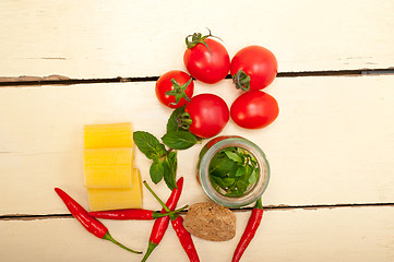 Image showing Italian pasta paccheri with tomato mint and chili pepper