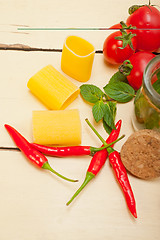 Image showing Italian pasta paccheri with tomato mint and chili pepper