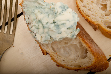 Image showing fresh blue cheese spread ove french baguette