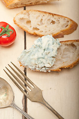 Image showing fresh blue cheese spread ove french baguette