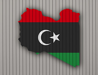 Image showing Map and flag of Libya on corrugated iron