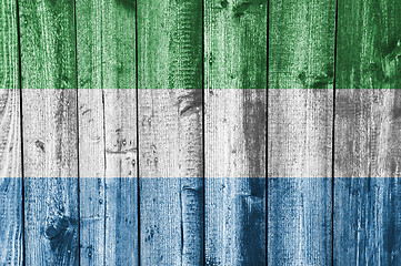 Image showing Flag of Sierra Leone on weathered wood