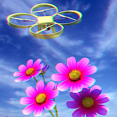 Image showing Drone, quadrocopter, with photo camera against the sky and Beaut