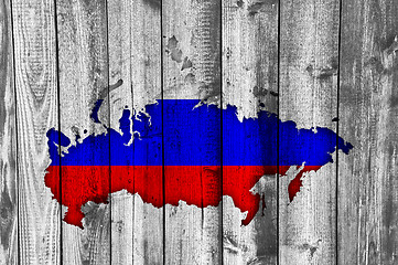 Image showing Map and flag of Russia on weathered wood