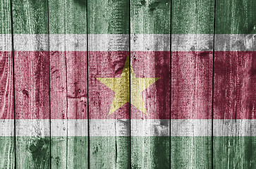 Image showing Flag of Suriname on weathered wood